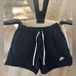 Nike Men’s Black Athletic Shorts-Length is Short - well above knee. Teen boy.